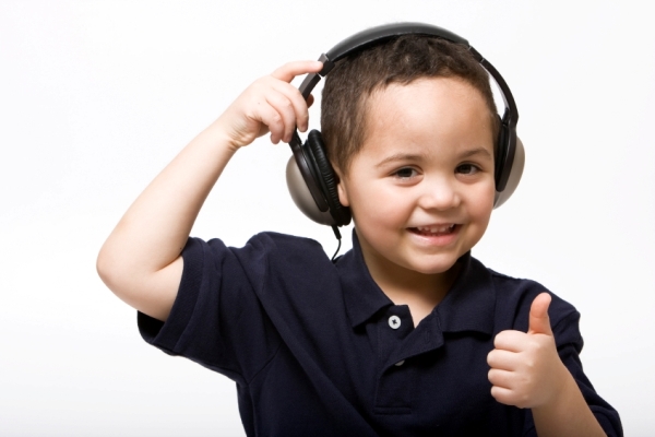 child listening to music